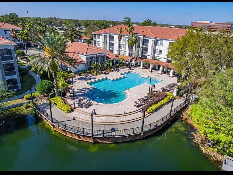 Aerial view of beautiful pool and clubhouse at Bella Terra