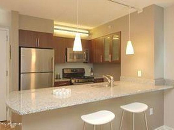 2nd image of 555 W 23rd St APT S8c