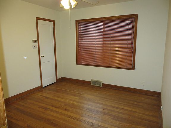 Formal dining room with storage closet.