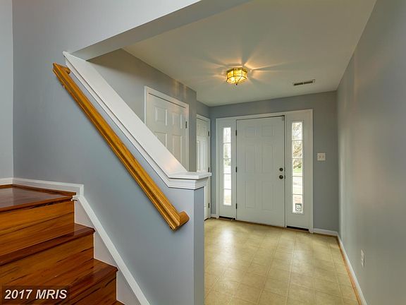 Large entryway with coat closet