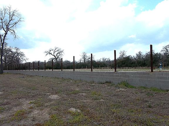 View of arena built up. Could have stone and Texas stars to complete look.