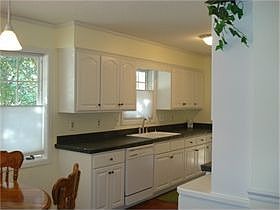 The dishwasher is a Whirlpool Gold, Quiet Wash Plus