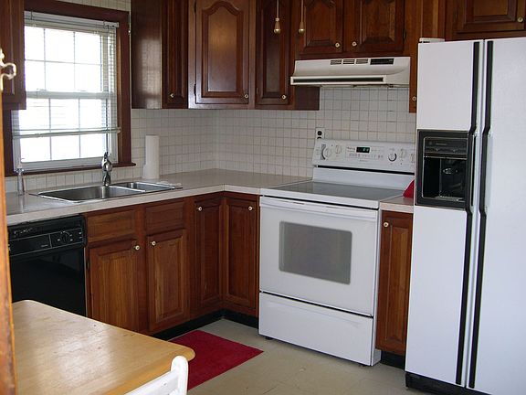 remodelled kitchen with cherry cabinets