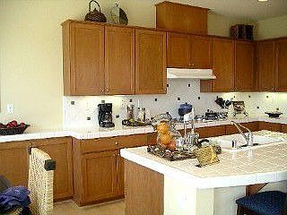 Cherry shaker style cabinetry
