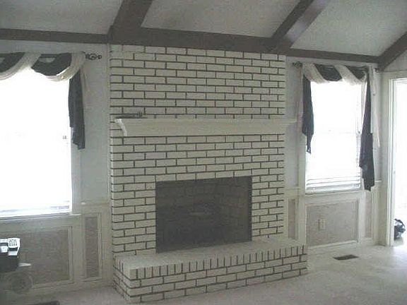 Family room w/ vaulted ceiling