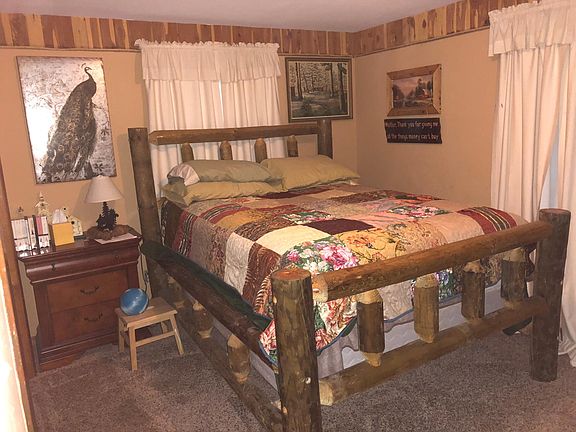 Full Bedroom cozy living room with wood burner