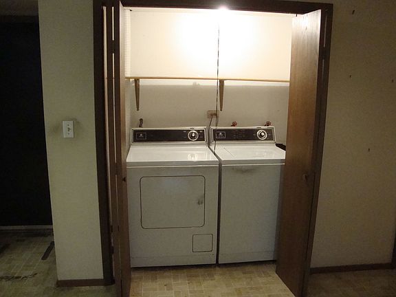 Washer & dryer off kitchen