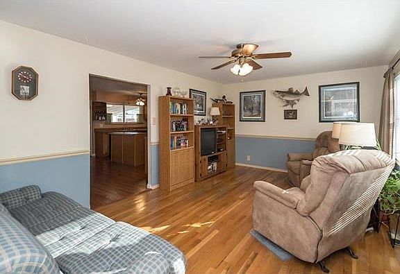 Living room with original wood floors.