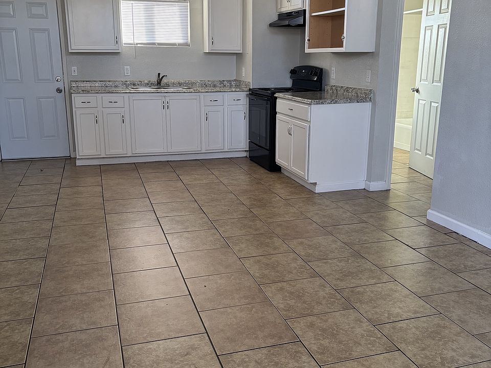 LIVING ROOM AND KITCHEN AREA