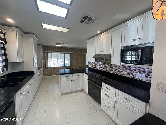 5th image of 10960 N 67TH Avenue #202
