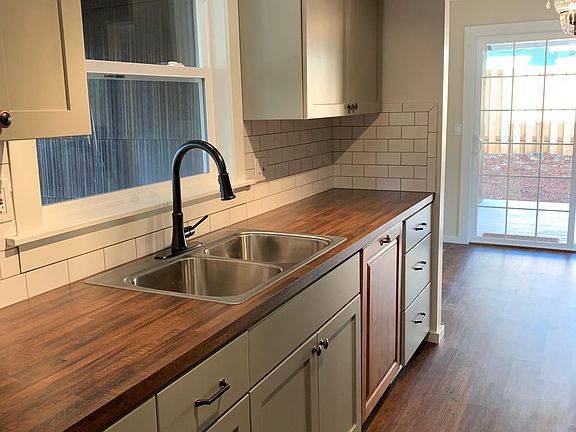 NEW KITCHEN, all flooring, cabinetry, tile, windows, fixtures and appliances BRAND New. Tenant will be the first to use!
