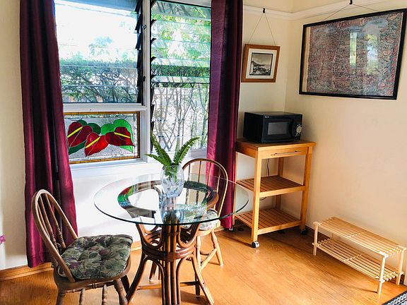 Kitchen /living room. Locally made stained glass window.