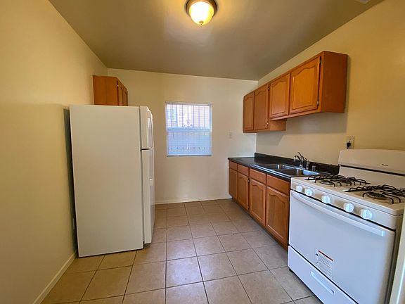 Kitchen, new stove and fridge.
