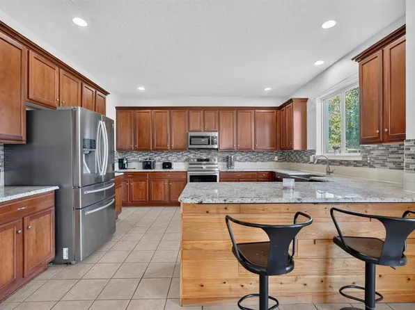77 ROLLINS LANE, PALM COAST, FL 32164