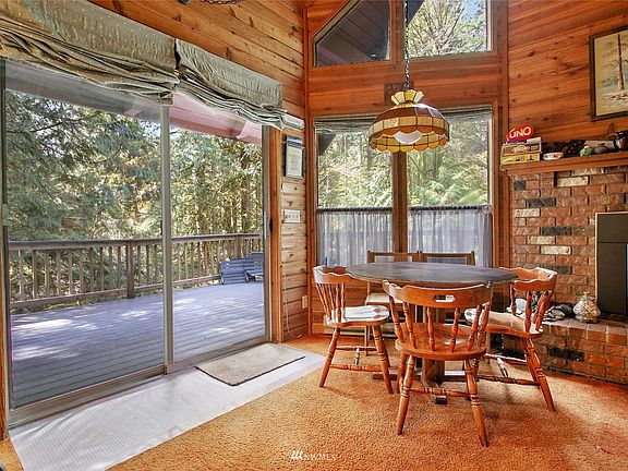 The sliding glass door is the entrance to the cabin