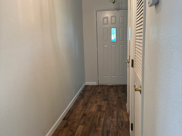 Hallaway from kitchen to front door
