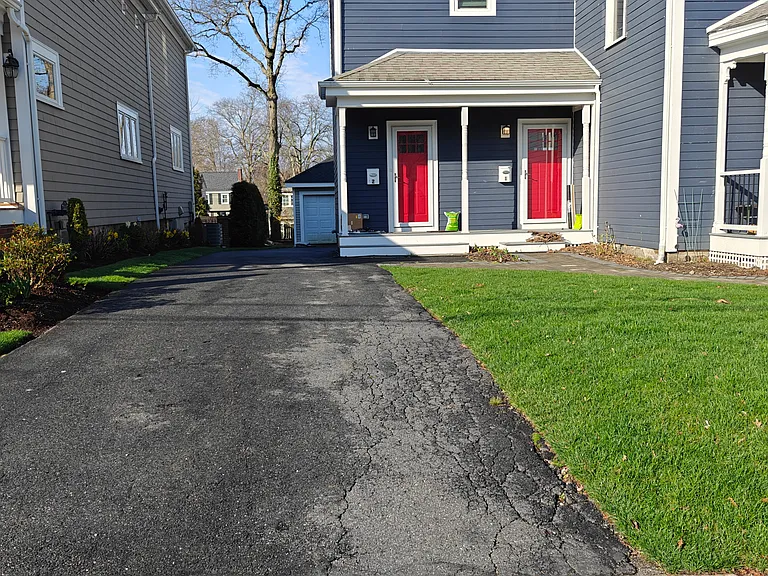 Driveway to the side of the house
