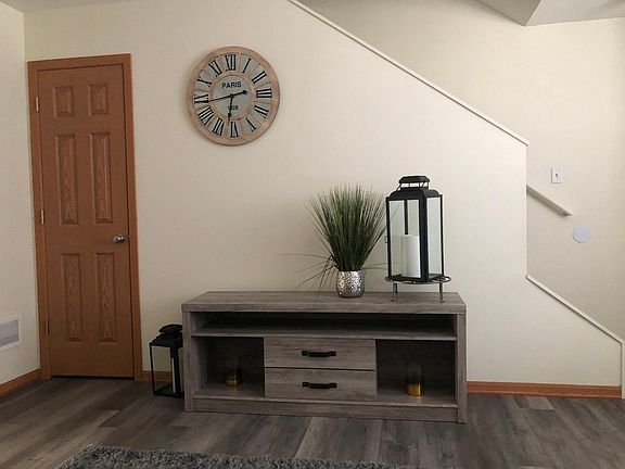 Living room, storage under neath stairs, 572