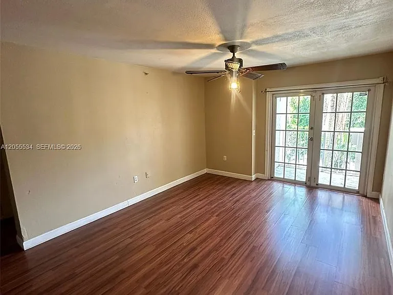 5035 Wiles Rd #203 — Photo 1