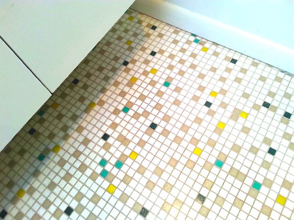 Bathroom floor glass tiles