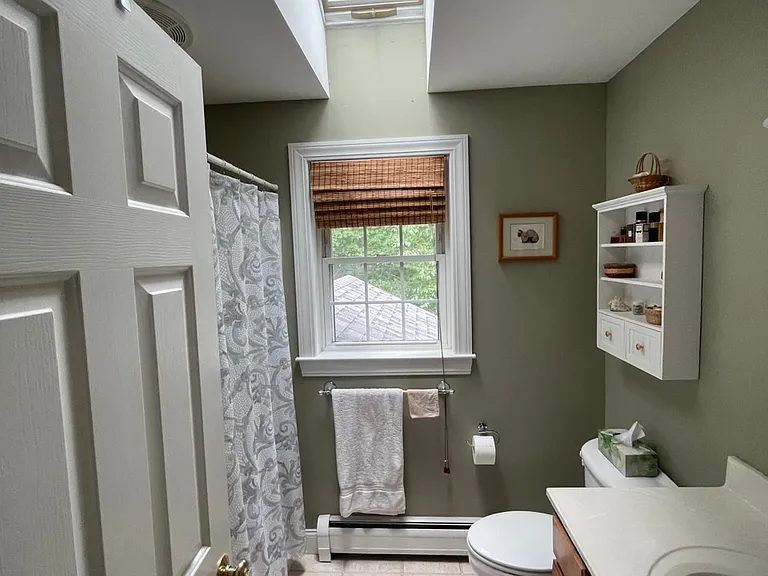 Top floor bath with skylight