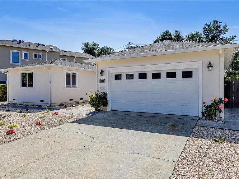 Private driveway parking and a welcoming entrance in a quiet neighborhood, conveniently located near Cupertino and major Silicon Valley employers.