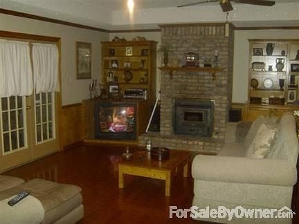 Living Room
						:
						Large Living Room wFirestove & Shelves and Cabinets on Each Side
