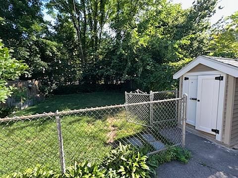Fenced in backyard shared with one other unit