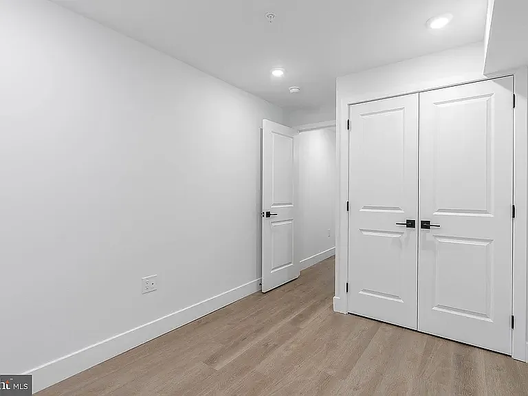 Basement bedroom, with a window for natural light.