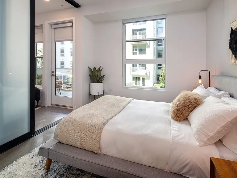 Bedroom with sliding barn door