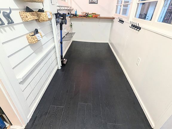 Mud room entrance. Heated floor. Storage.