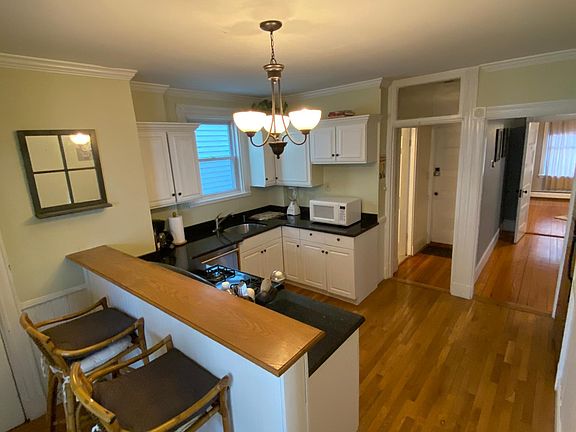 Kitchen with full amenities and dining bar