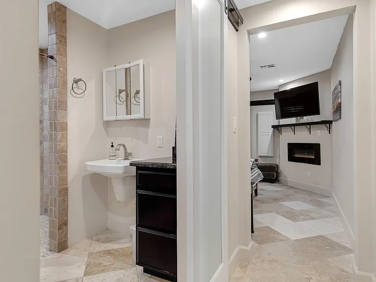 Entry to NW King bedroom with ensuite bathroom.