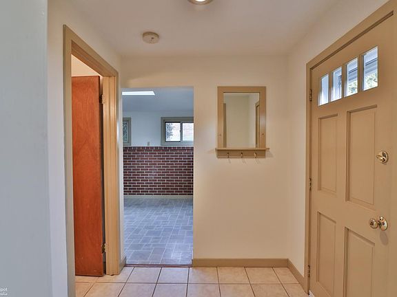 Facing dining/bonus room with bathroom to the left