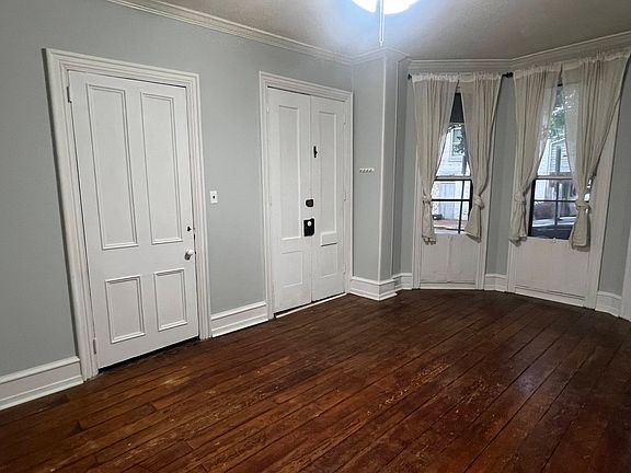 Living room with plenty of natural light. Private entrance into apartment.