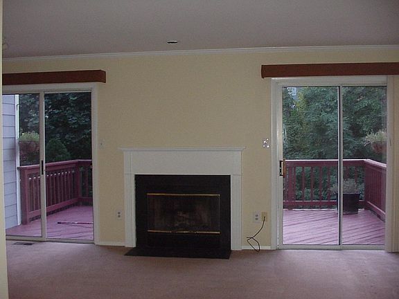 Spacious living room with a fireplace.