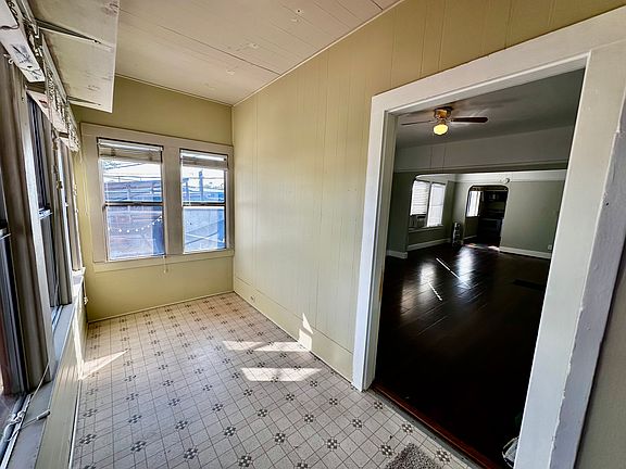 Enclosed Sun Room Photo #1 Showing Great Room (There is a Entrance Door from Sun Room into Home)