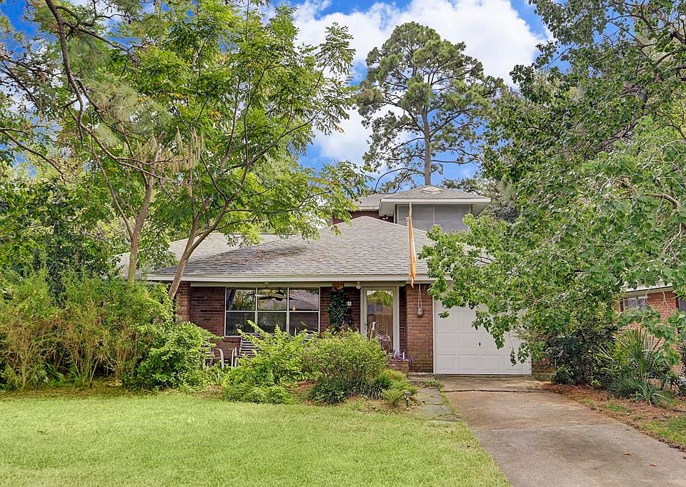 Charming 2 bedroom 2 bath on corner lot with beautiful landscaping.