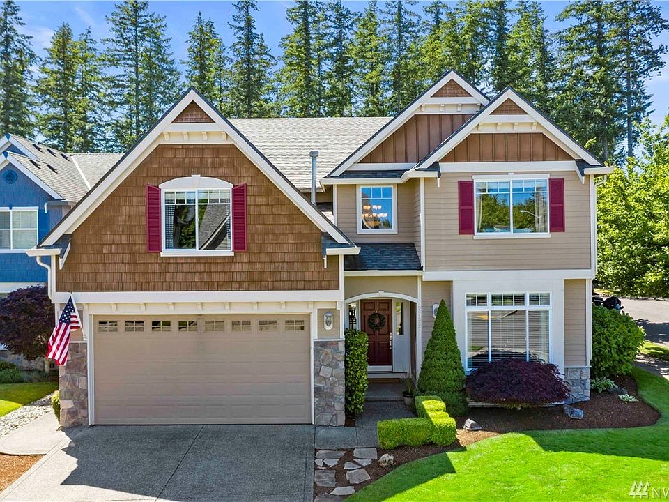 Welcome home! 3 car garage (tandem) on a large corner lot. 