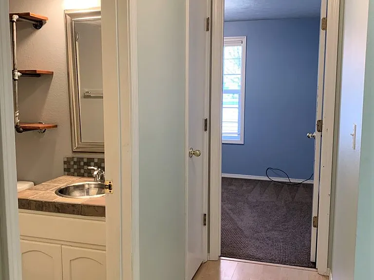 6902 N Prescott Ave — Photo 20
