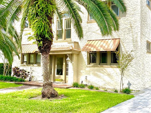 Outside looking at building. Unit is bottom level.