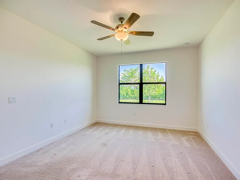 12555 SW Manatee Marsh Ter — Photo 15