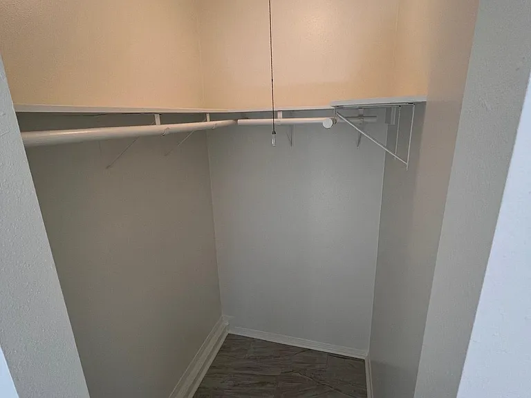 Walk-in closet in bedroom