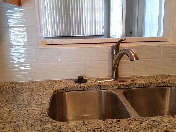 KITCHEN GRANITE OPEN TO DEN