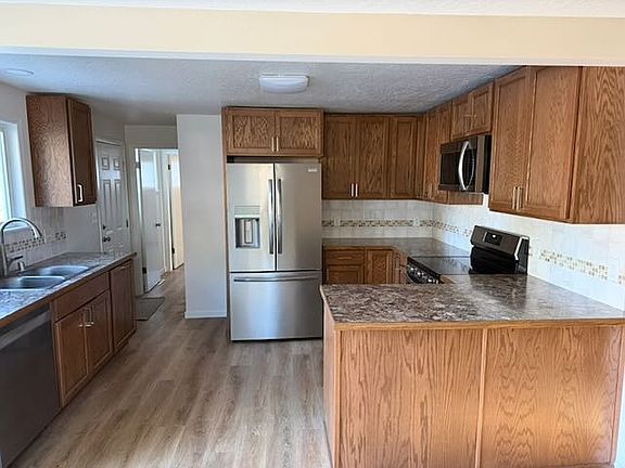 3rd image of 6105 E 12th Ave