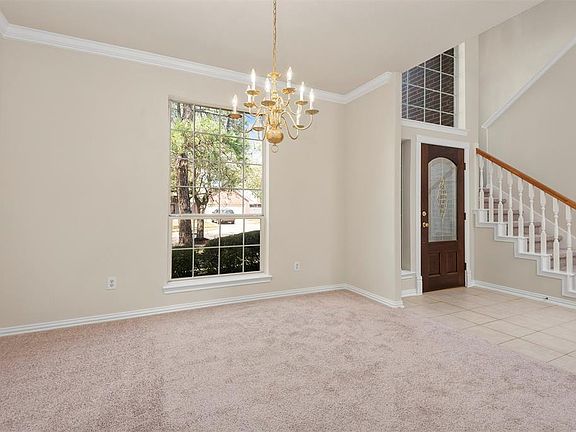 The formal dining room is also open to the foyer.
