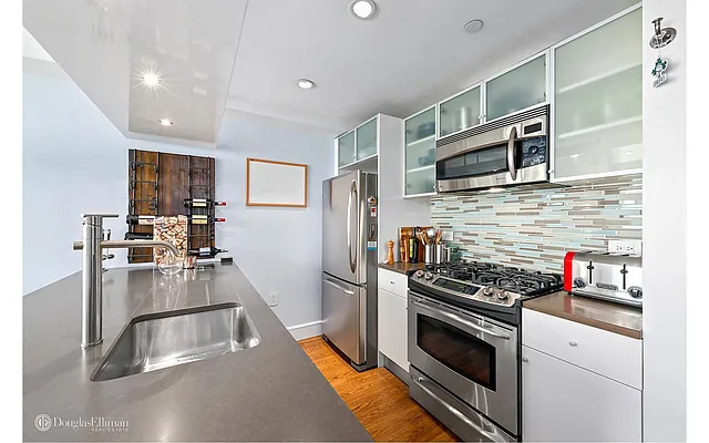 Sold by Douglas Elliman | media 13