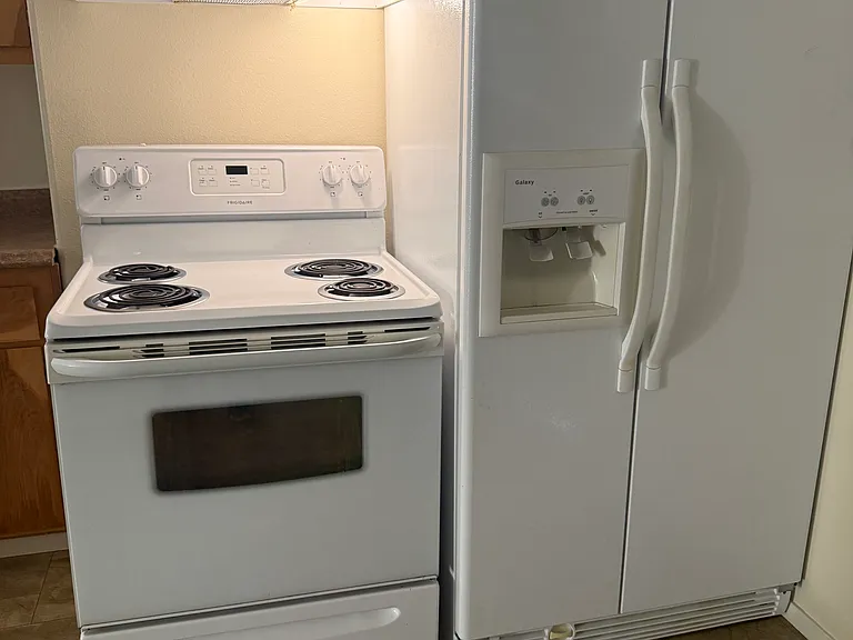 Here's the refrigerator just installed, as stated in the property description.