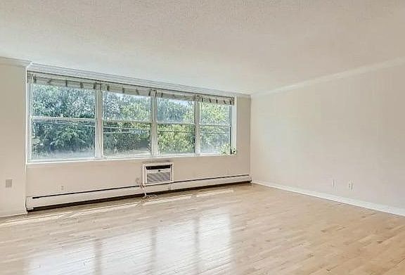 Light-filled living area, open to dining and kitchen space
