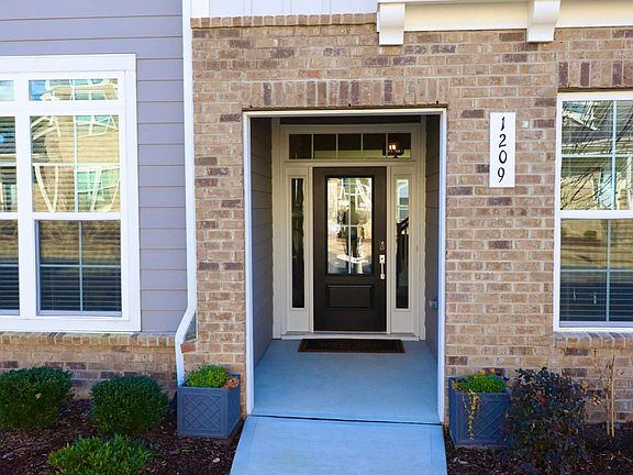Covered entryway perfect for arriving guests or having packages delivered during bad weather.